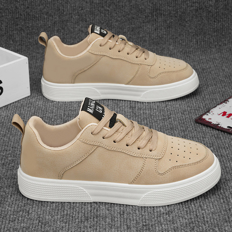 Men's white low-top lace-up sneakers with perforated toe cap for breathable everyday streetwear comfort