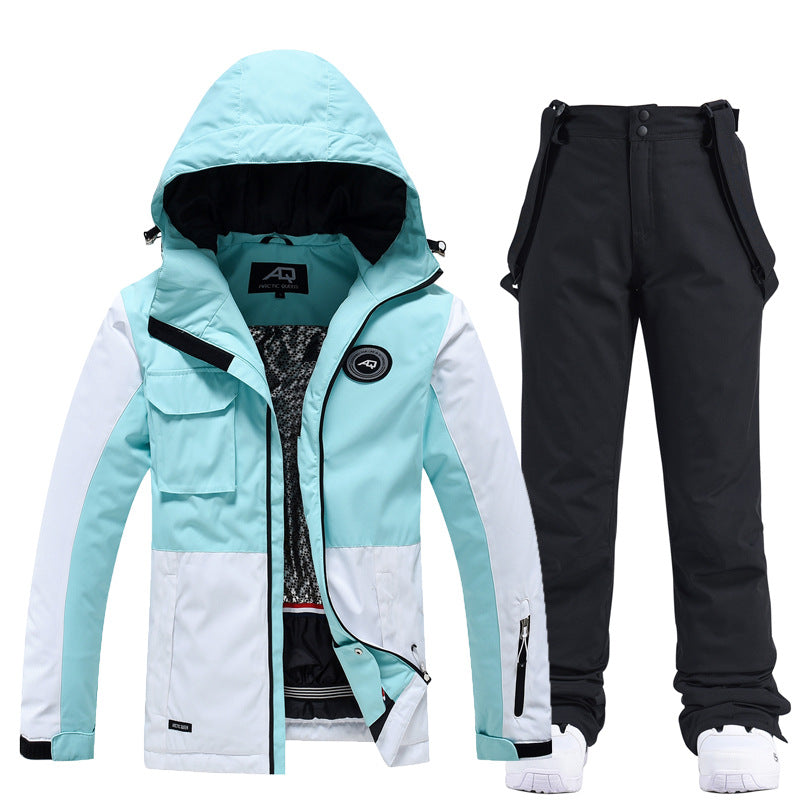 Women's two-piece ski suit in tailored fit, water-resistant windproof jacket and pants for slopes