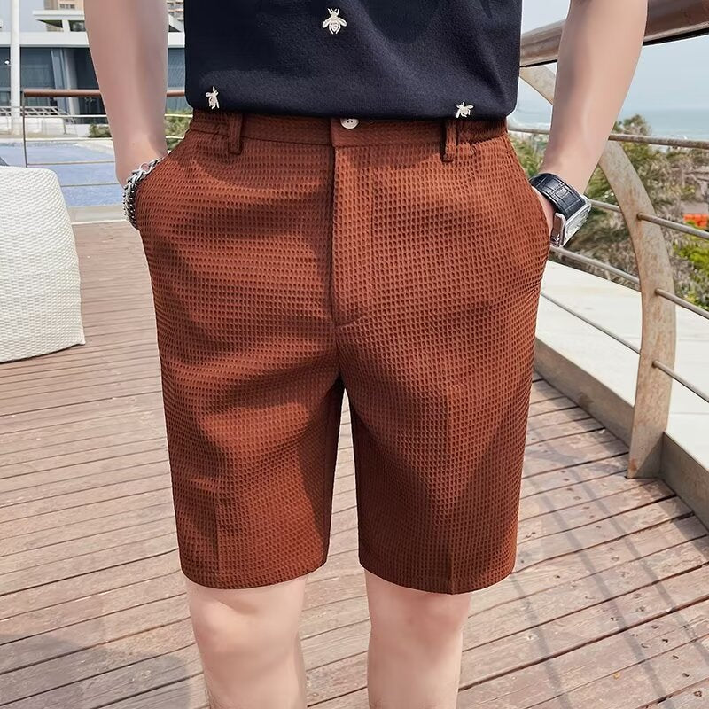 Men's slim fit knee-length shorts with buttoned waist and belt loops for casual summer style