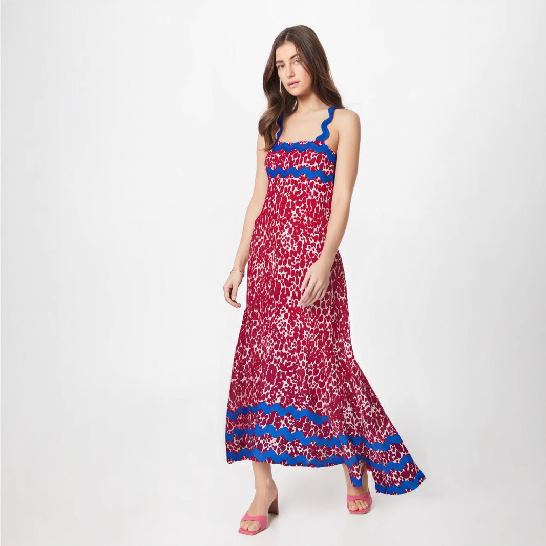 Women's lightweight floral maxi dress with flowing drape and wavy detailing for summer festive style