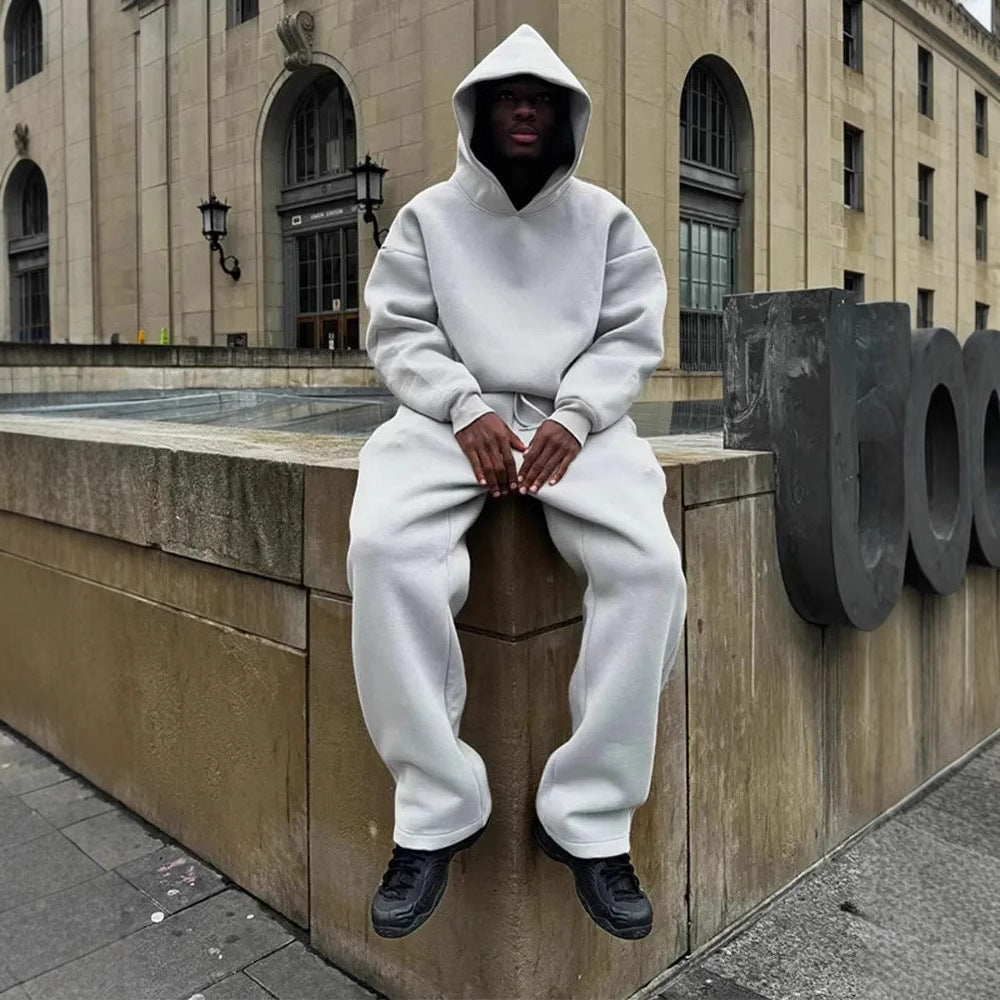 Oversized unisex cotton blend tracksuit set with hoodie pockets in Nordic-inspired relaxed fit