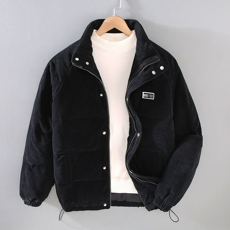 Men's long fit black quilted puffer jacket with hood and textured surface for winter warmth
