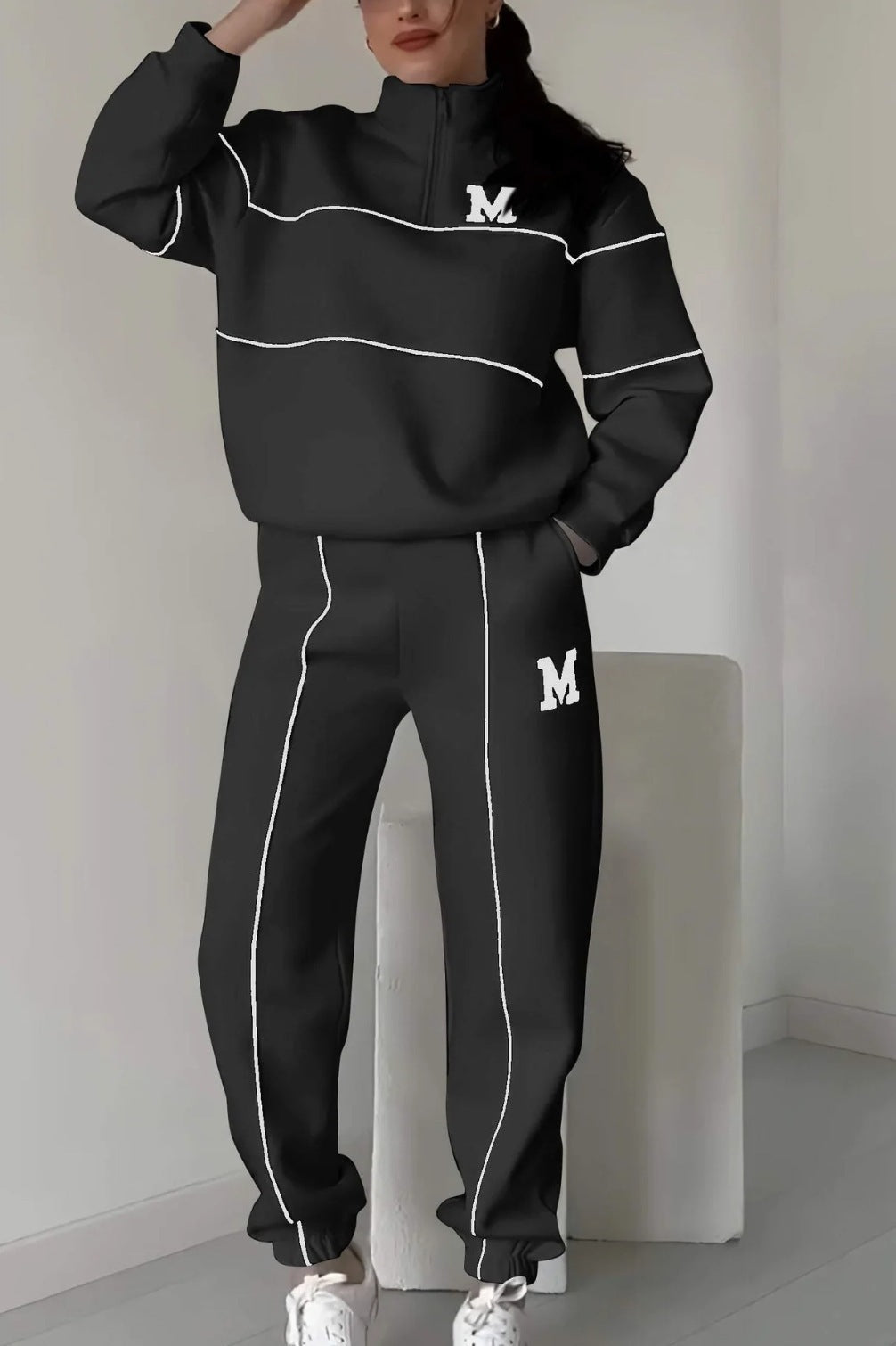 Women's relaxed fit tracksuit set with half zipper top and elastic waist pants casual style