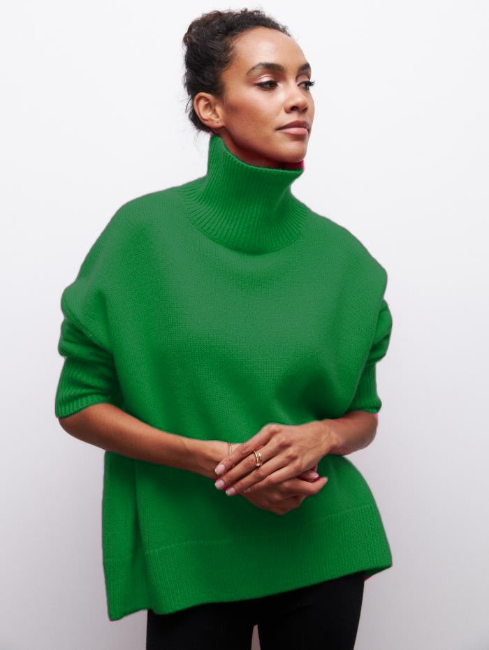 Women's oversized turtleneck knit sweater cozy soft casual everyday wear relaxed silhouette high neck