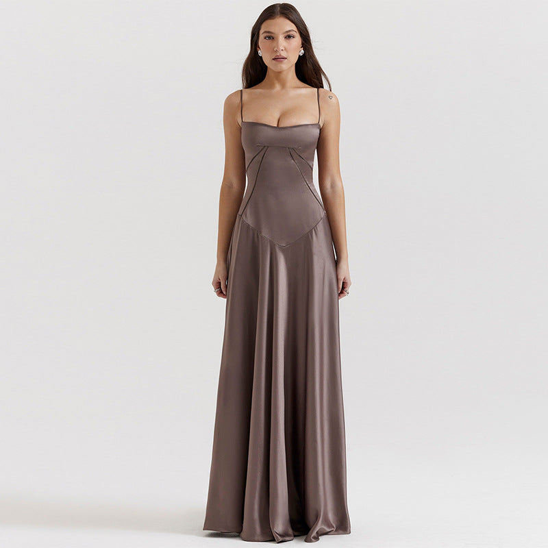 Women's satin A-line long dress with spaghetti straps and cut-out waist detail for glamorous evenings