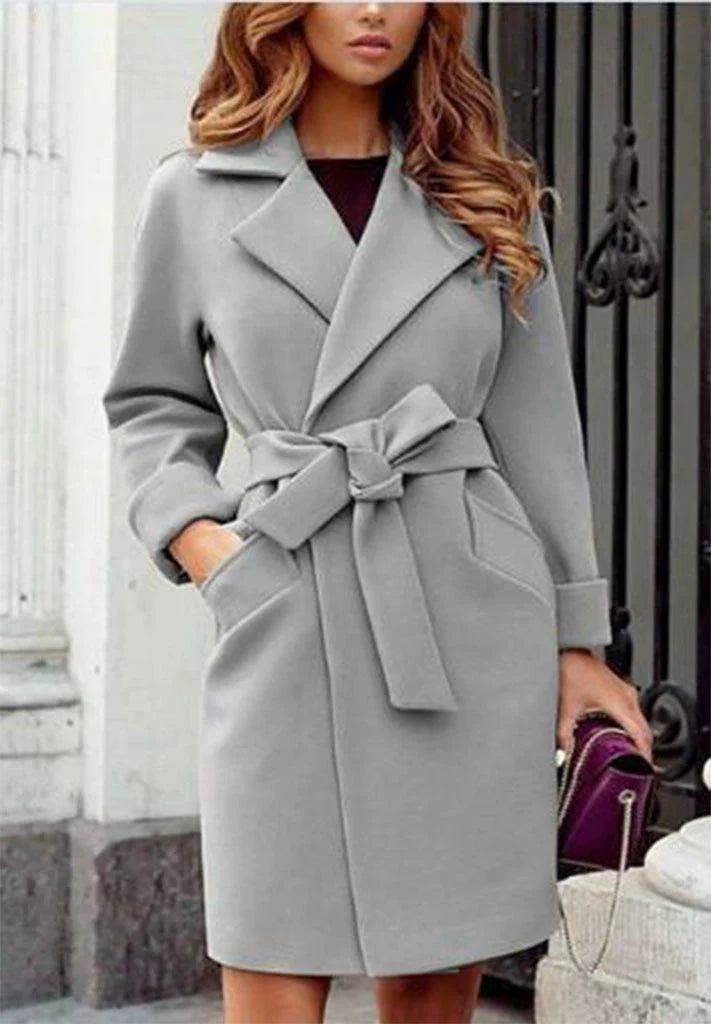 Women's black mid-length wool trench coat with classic lapel and open front, cozy winter essential