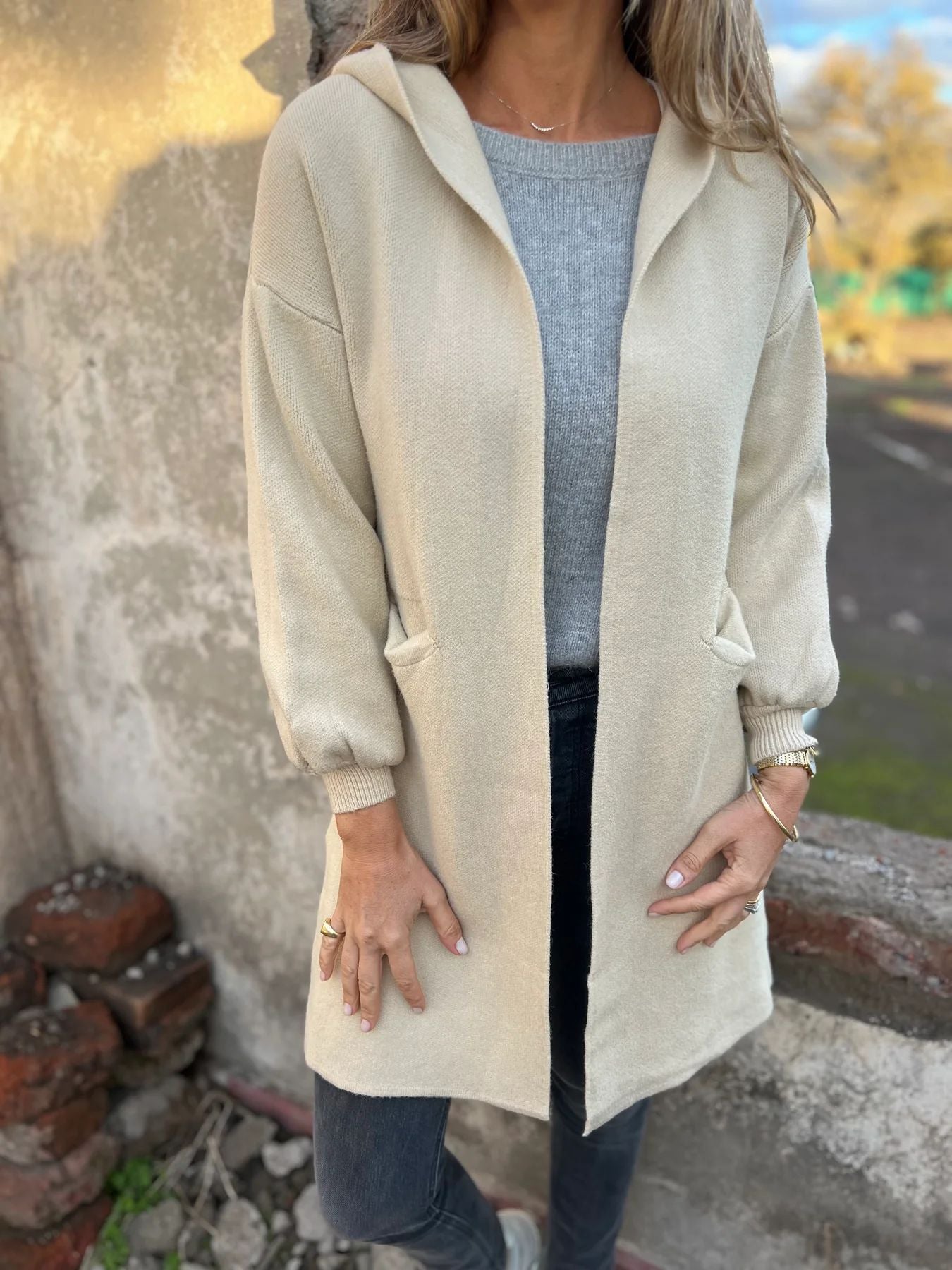 Women's beige hooded knit cardigan open-front relaxed fit with attached hood for cozy layering