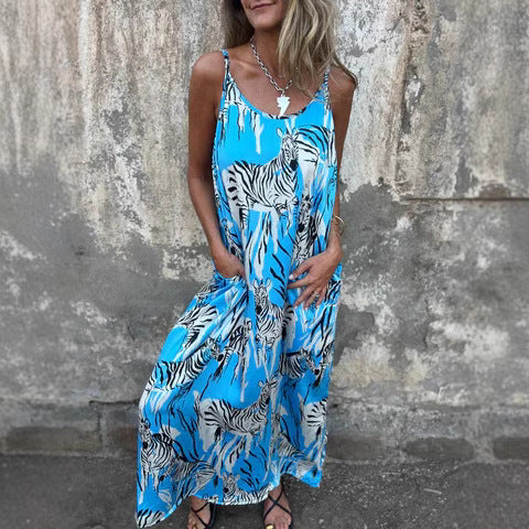 Women's flowy maxi dress with adjustable straps, relaxed silhouette, and side pockets for everyday wear