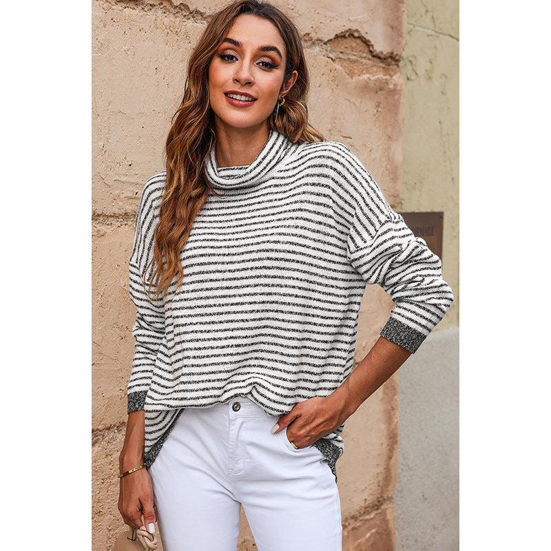 Women's striped turtleneck sweater relaxed fit wool texture knit with ribbed edges in warm tones