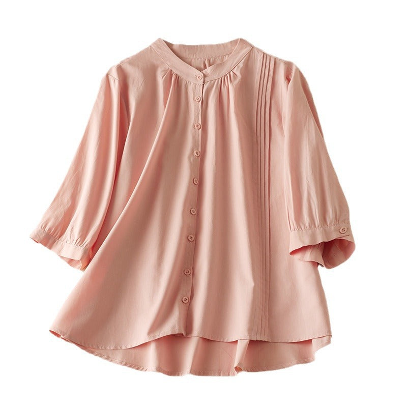 Women's relaxed fit natural fiber shirt with stand collar and timeless pleated detail