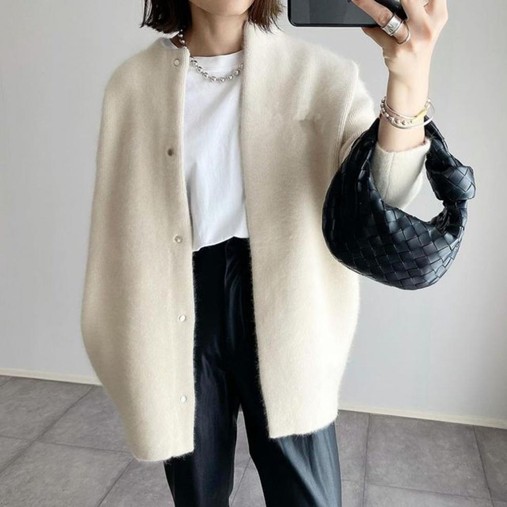Women's oversized knit cardigan cozy button-front mid-length layering piece in neutral tones