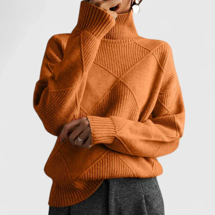 Women's slouchy high-neck winter sweater with softly draped silhouette for cozy polished everyday look