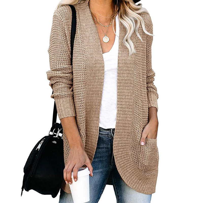 Women's relaxed fit open front knit cardigan with V-neck, pockets, and drapey silhouette for casual wear