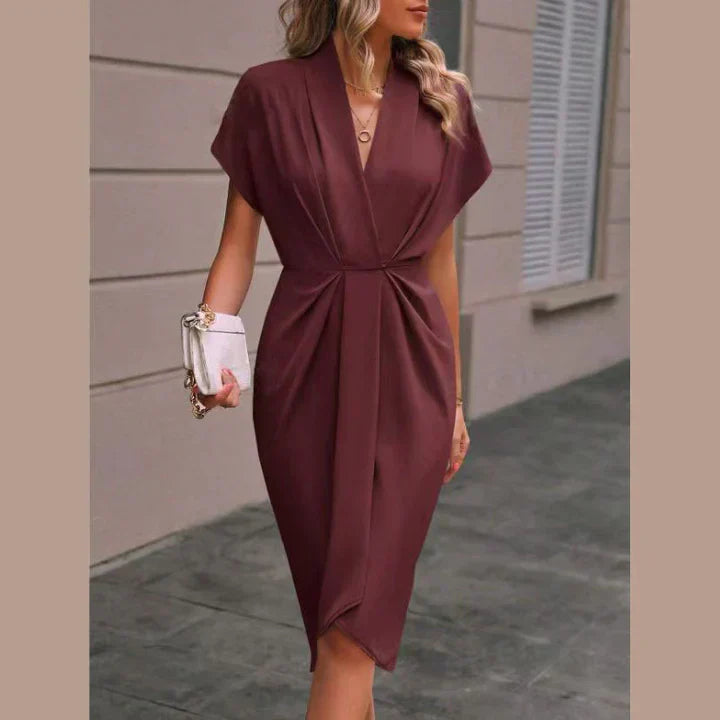 Black midi wrap dress with classic V-neckline silhouette, easy-care fabric for office to evening wear