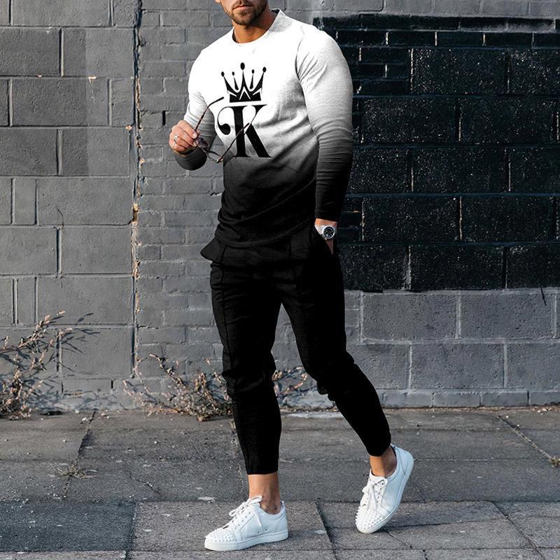 Men's slim fit two-piece tracksuit set with bold 3D print pullover and tapered stretch pants