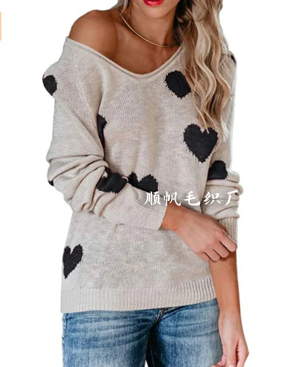 Women's red Christmas knit sweater with heart print design, cozy festive style for holiday season