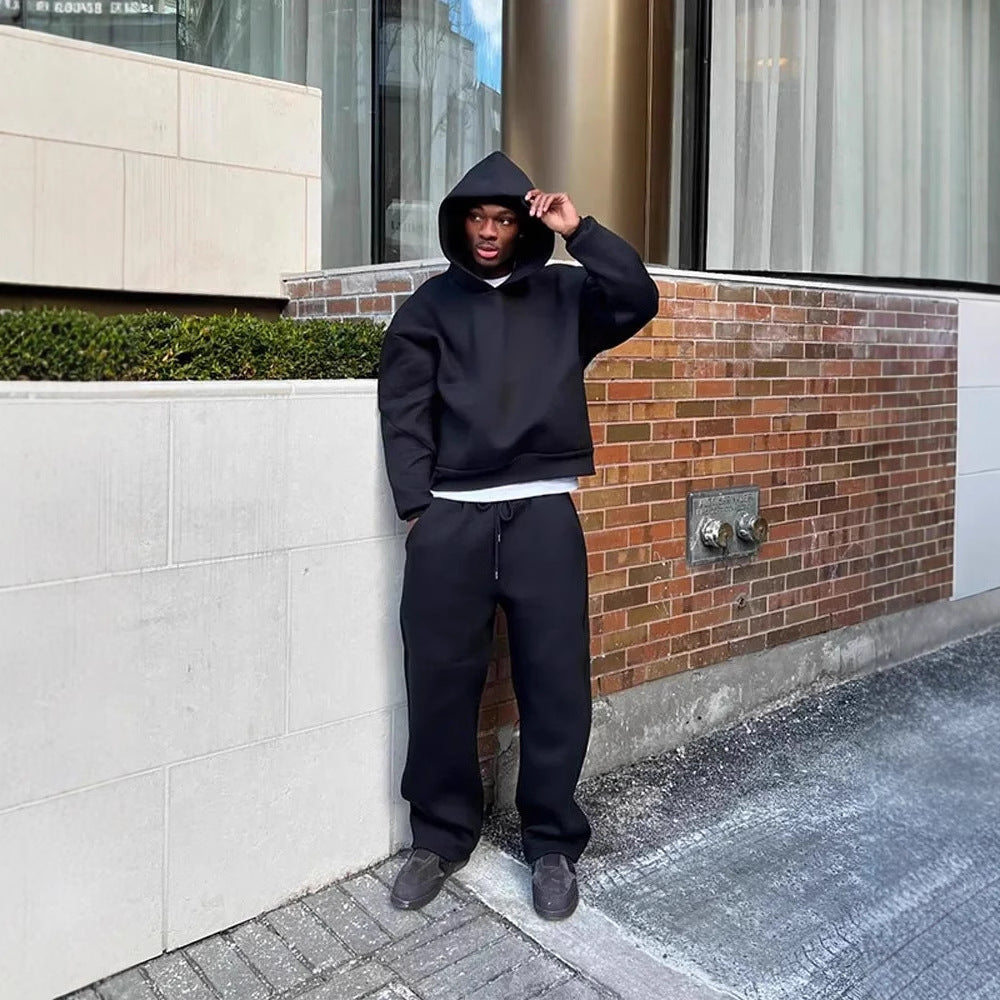 Oversized unisex cotton blend tracksuit set with hoodie pockets in Nordic-inspired relaxed fit