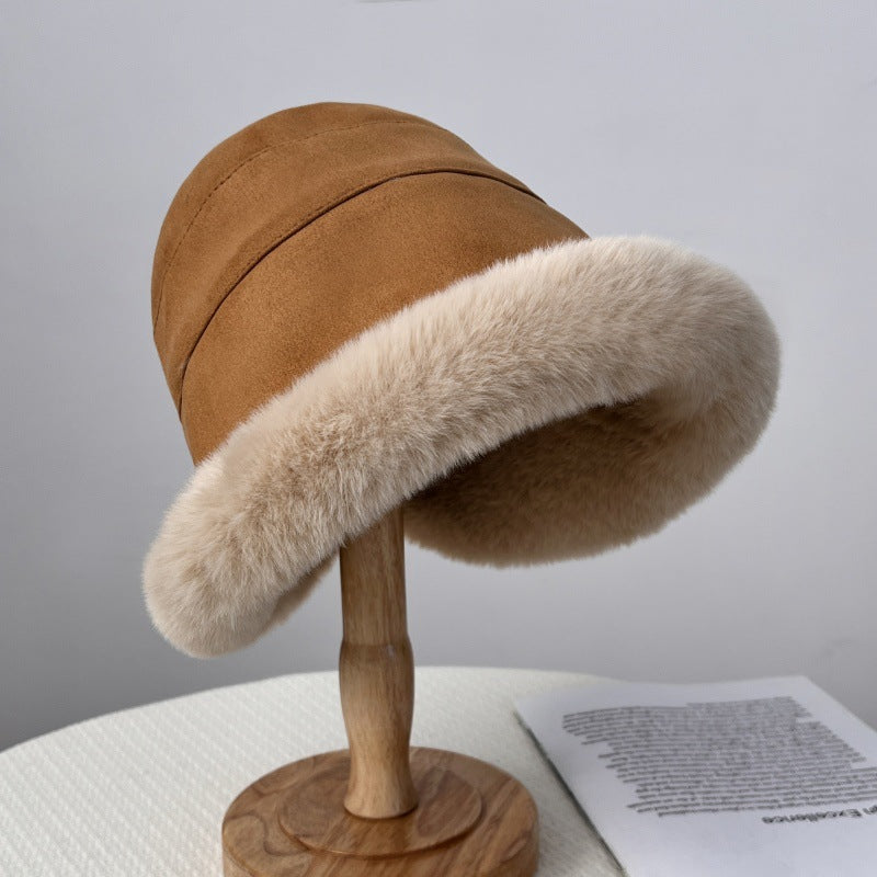 Women's winter plush synthetic fur hat in elegant cozy style with luxurious fur trim accent