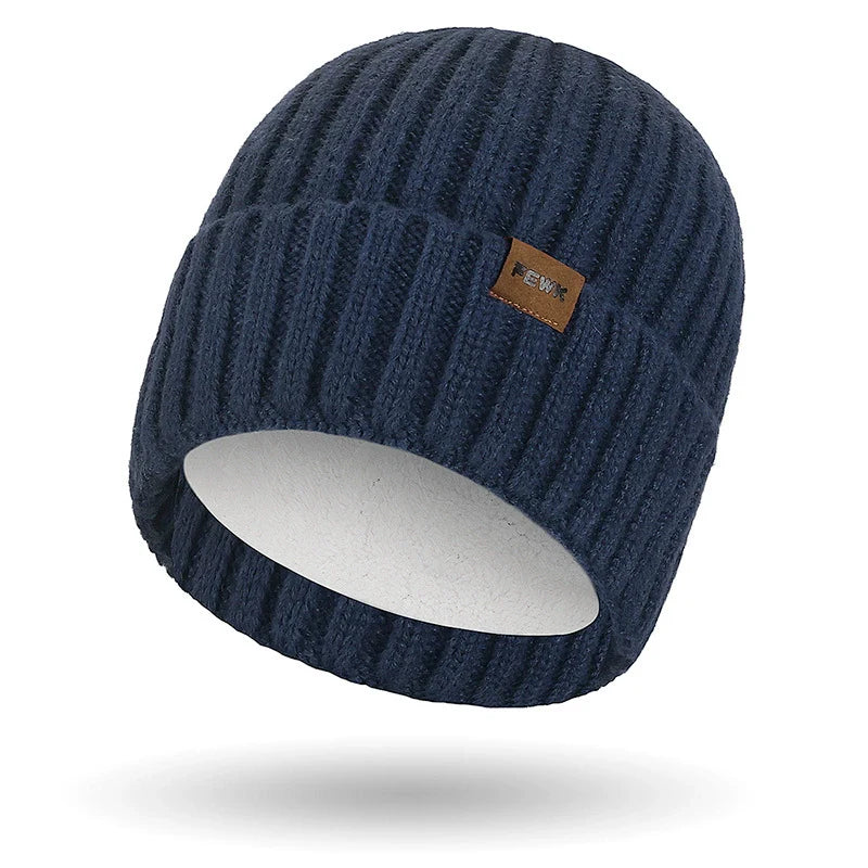 Dark knit unisex beanie with fold-over ribbed cuff and subtle stitched patch for casual everyday wear