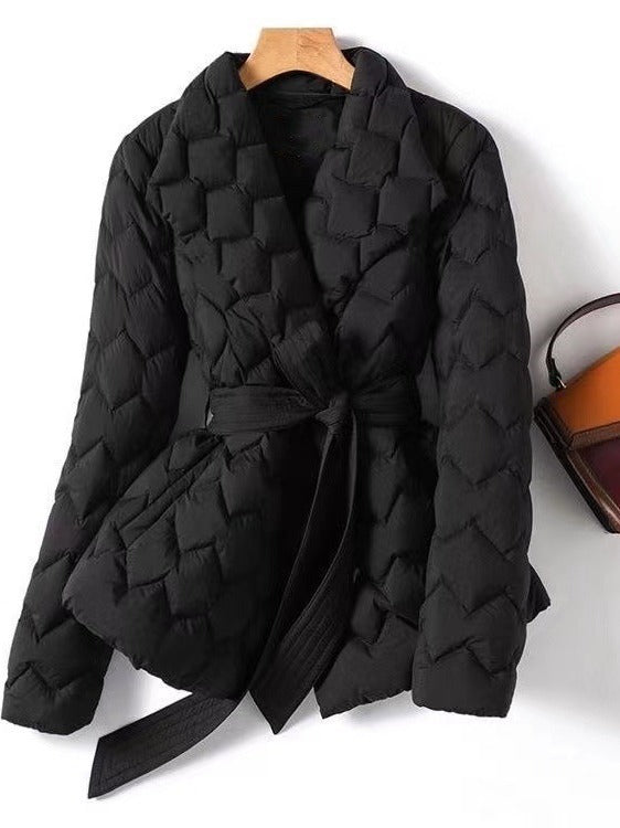 Women's black quilted jacket tailored fit with tie belt, hip-length notched collar chic style