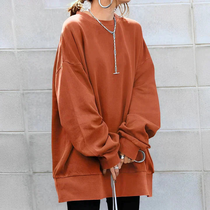 Women's oversized knit pullover sweater in neutral tone, relaxed drape silhouette for casual everyday comfort