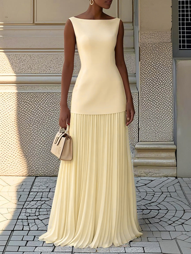 Ivory floor-length evening gown with sculpted bodice and soft pleated skirt for formal events