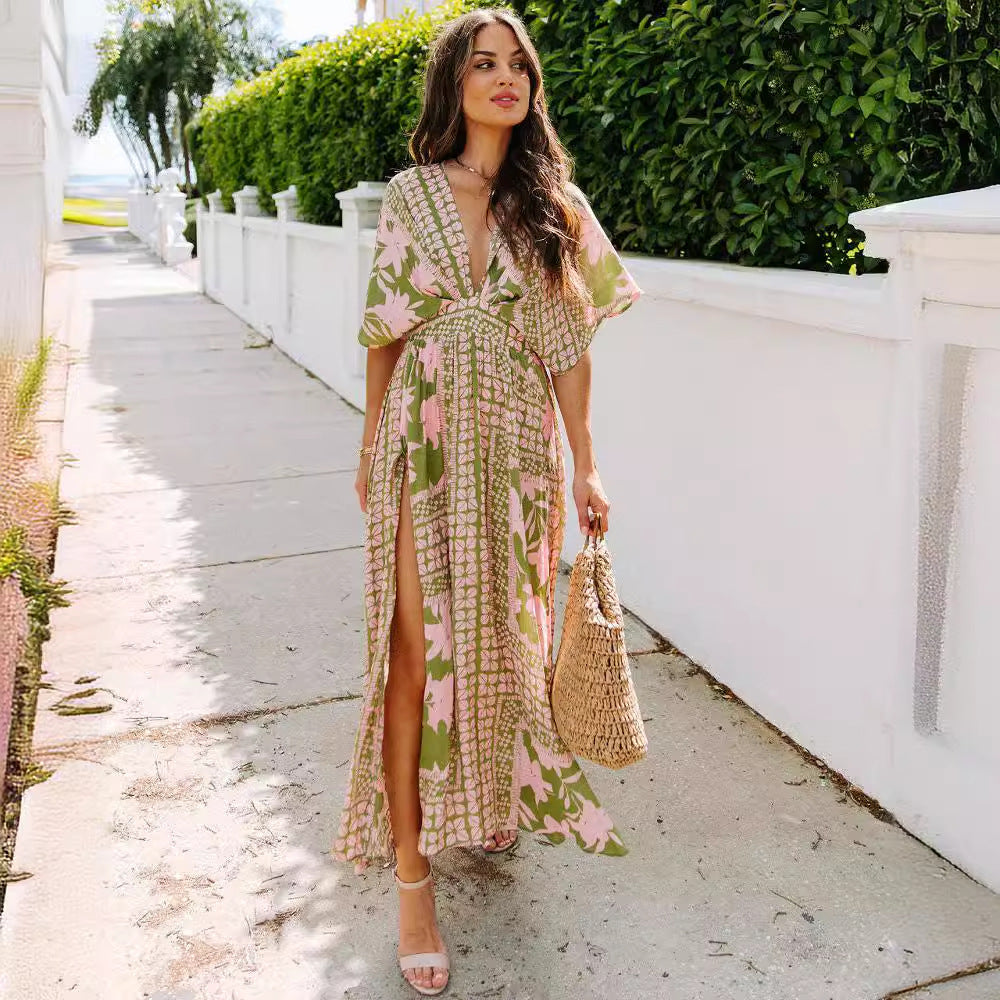 Women's floral maxi dress wrap neckline flowing silhouette with elegant side slit warm-weather style