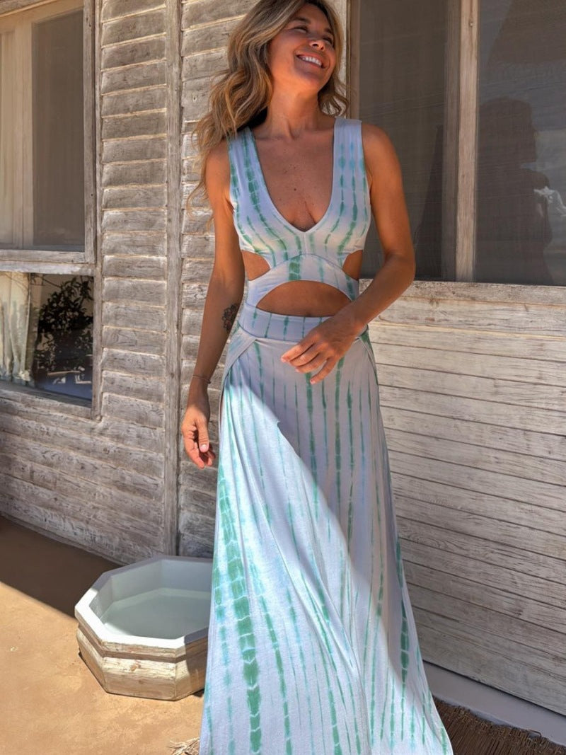 Women's slim fit maxi dress with V-neck, waist cutouts, and lightweight fabric for summer