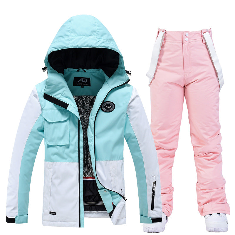 Women's two-piece ski suit in tailored fit, water-resistant windproof jacket and pants for slopes