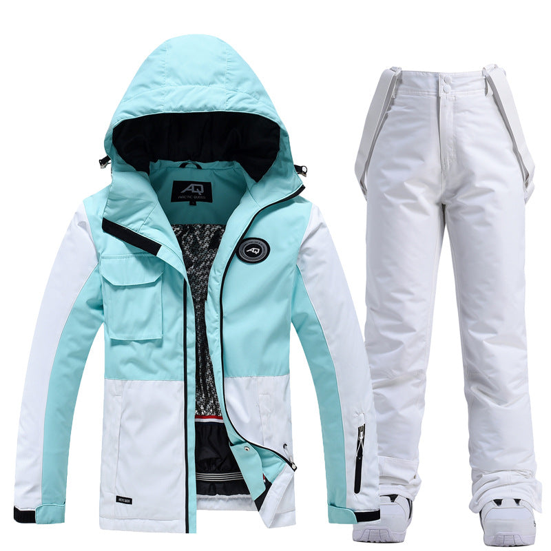 Women's two-piece ski suit in tailored fit, water-resistant windproof jacket and pants set