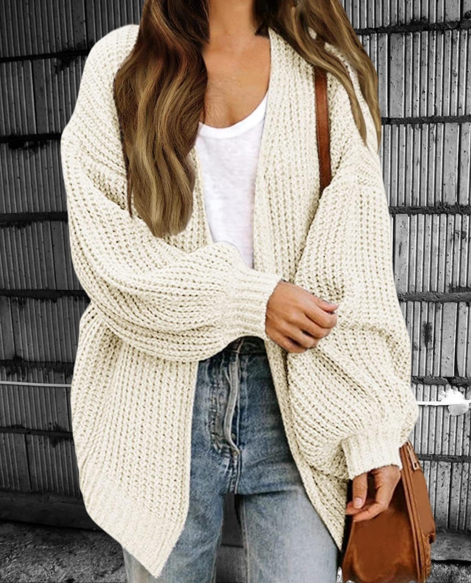 Women's chunky knit oversized open-front cardigan in cozy neutral tones for casual fall layering