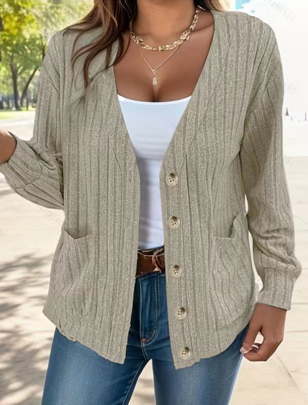 Women's relaxed fit ribbed knit cardigan with button front closure and side pockets for everyday wear