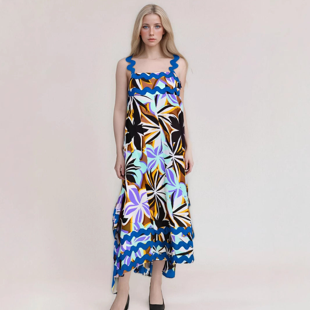 Women's lightweight floral maxi dress with flowing drape and wavy detailing for summer festive style