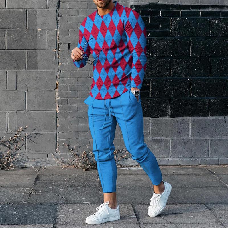 Men's slim fit two-piece tracksuit set with bold 3D print pullover and tapered stretch pants