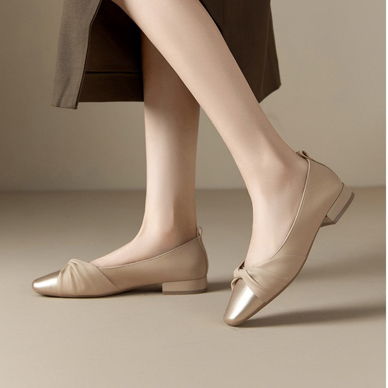 Women's low heel pointed toe pumps in soft PU leather with elegant twisted strap detail