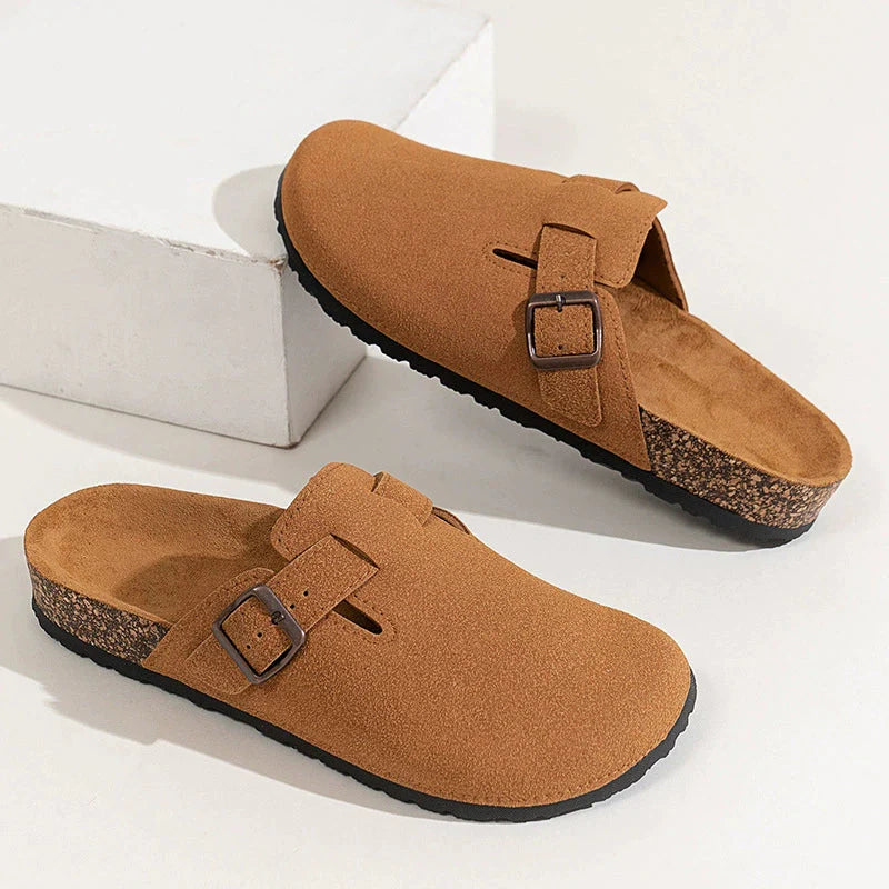 Women's suede finish clogs with adjustable buckle strap and supportive cork footbed for all-day comfort