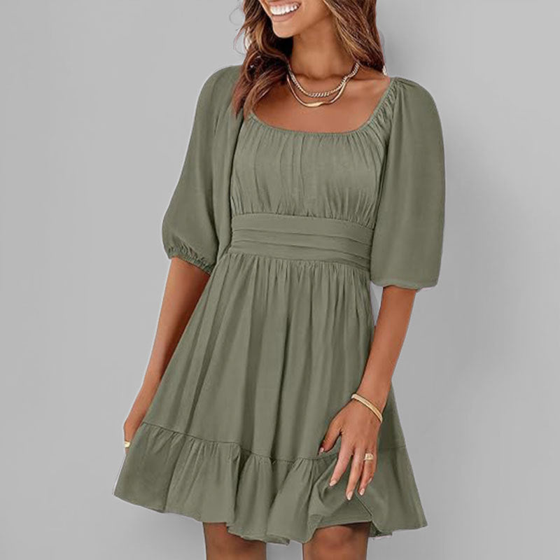 Women's white cotton fit-and-flare dress with square neckline, puff sleeves, and ruffle hem