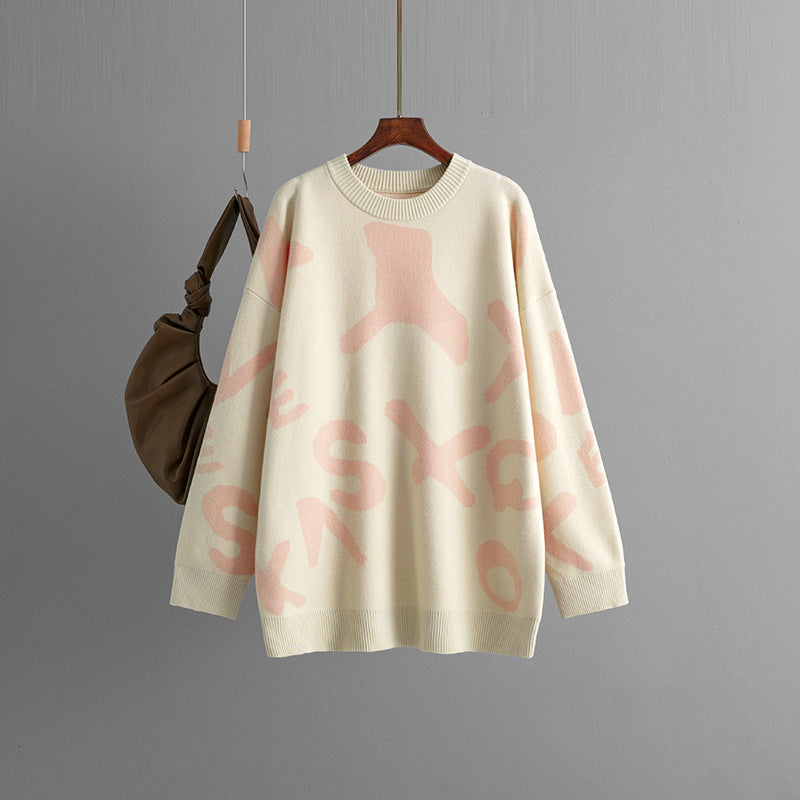 Women's oversized graphic knit sweater bold patterned cozy fall winter pullover relaxed silhouette