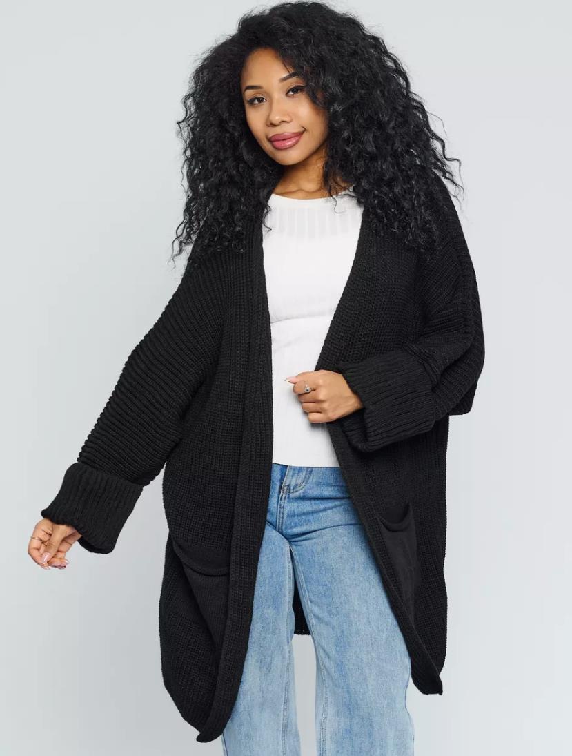 Women's oversized open-front knitted cardigan in cozy wool blend, relaxed layering essential