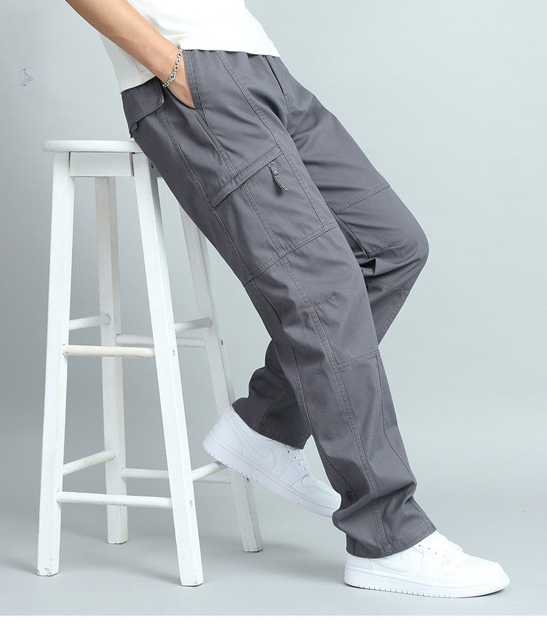 Men's relaxed fit cotton cargo pants in neutral tones with reinforced panels for durable workwear style