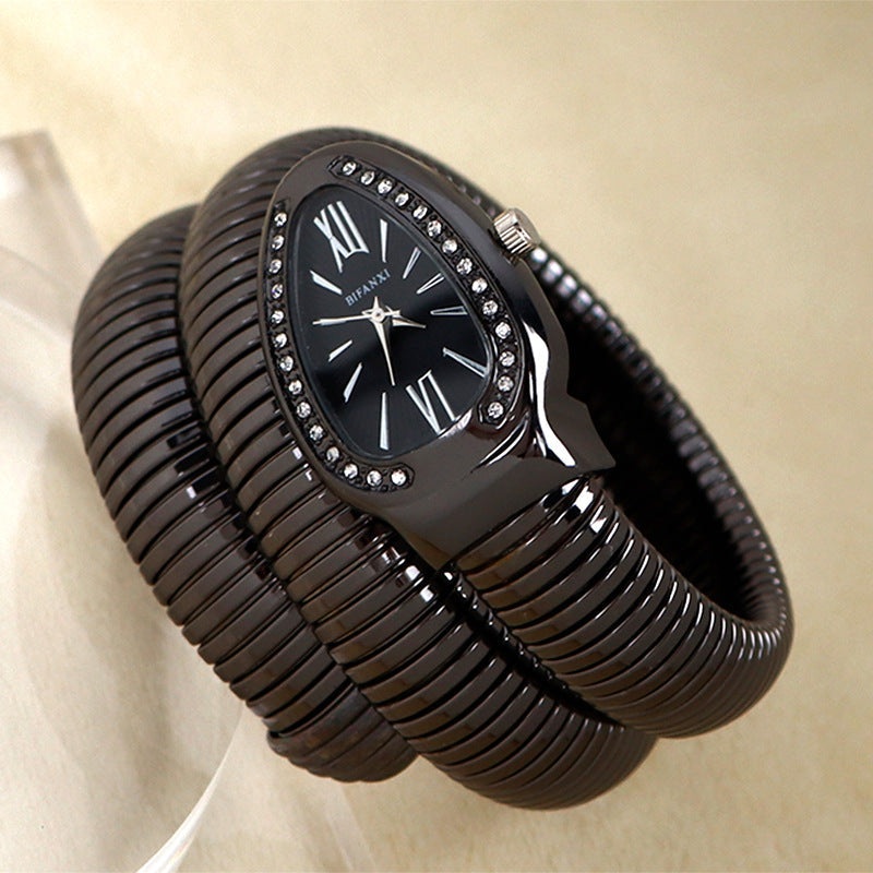 Women's snake-inspired quartz watch with custom bracelet, lightweight elegant accessory by Eloura Moda