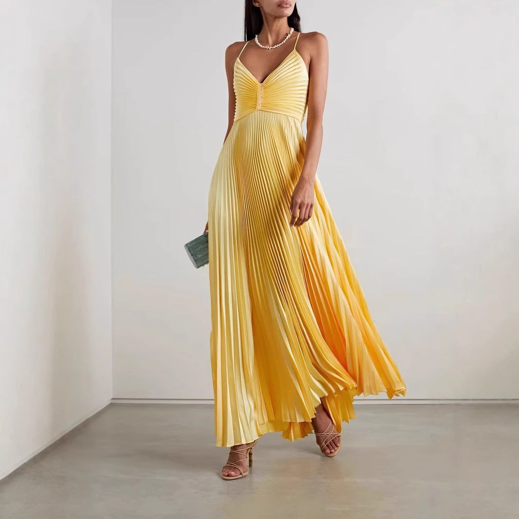 Women's chiffon maxi dress in pleated V-neck spaghetti strap style with floor-length silhouette