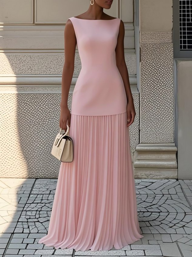 Ivory floor-length evening gown with sculpted bodice and soft pleated skirt for formal occasions