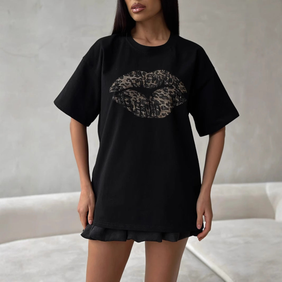 Women's loose fit white cotton tee with bold leopard lips graphic print, casual fashion-forward style