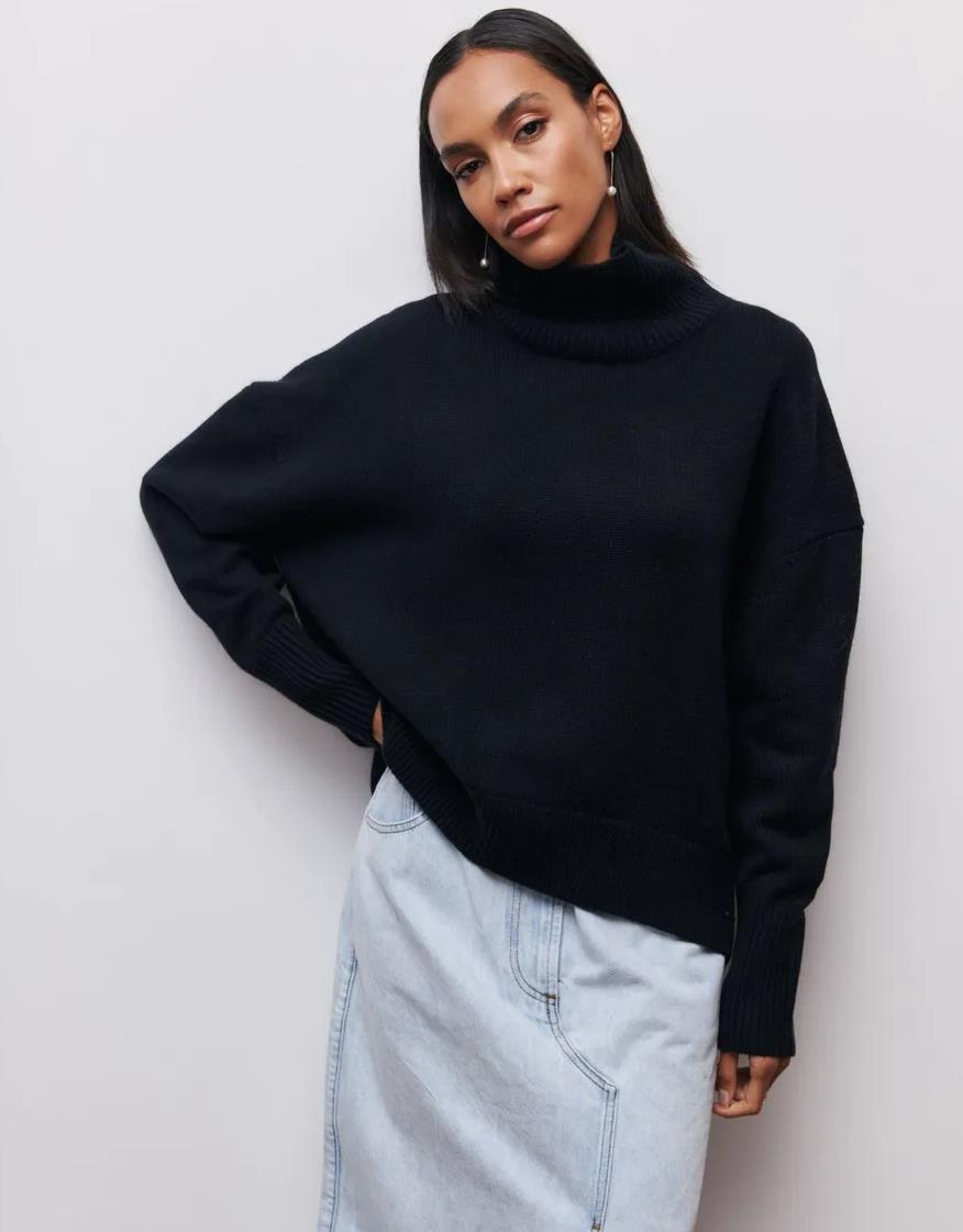 Women's oversized turtleneck knit sweater cozy soft casual everyday wear relaxed silhouette high neck