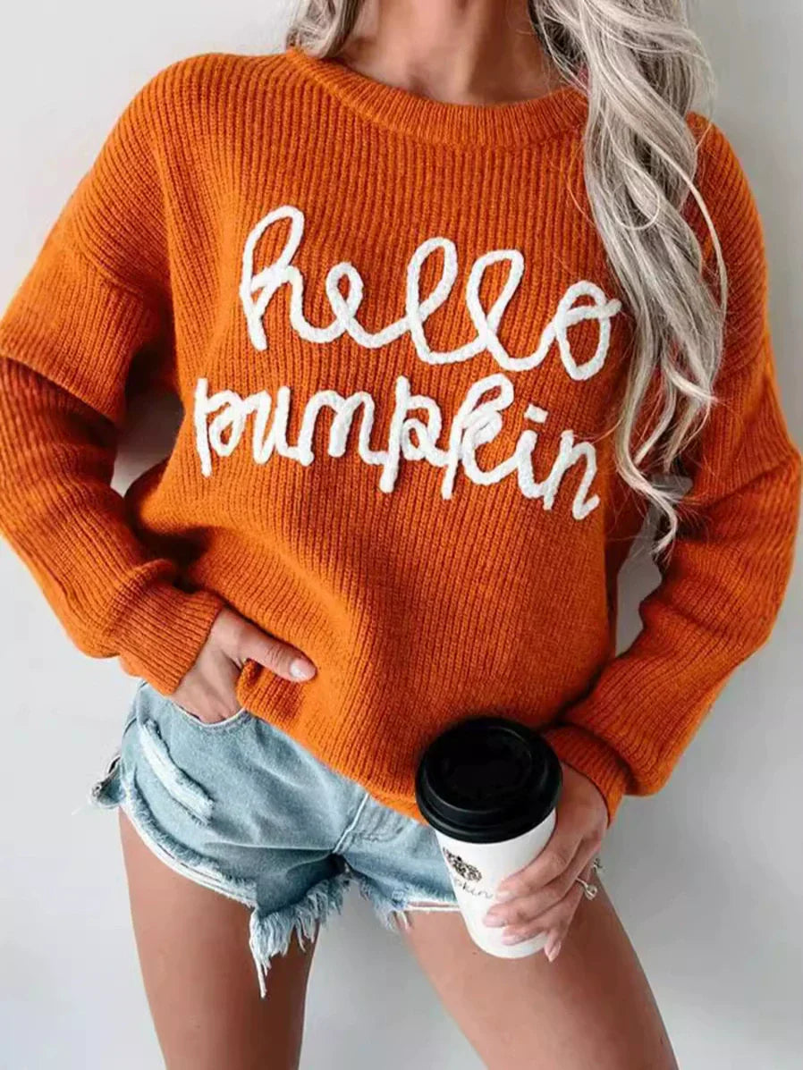 Women's wool blend relaxed fit sweater with ribbed texture and subtle letter detail
