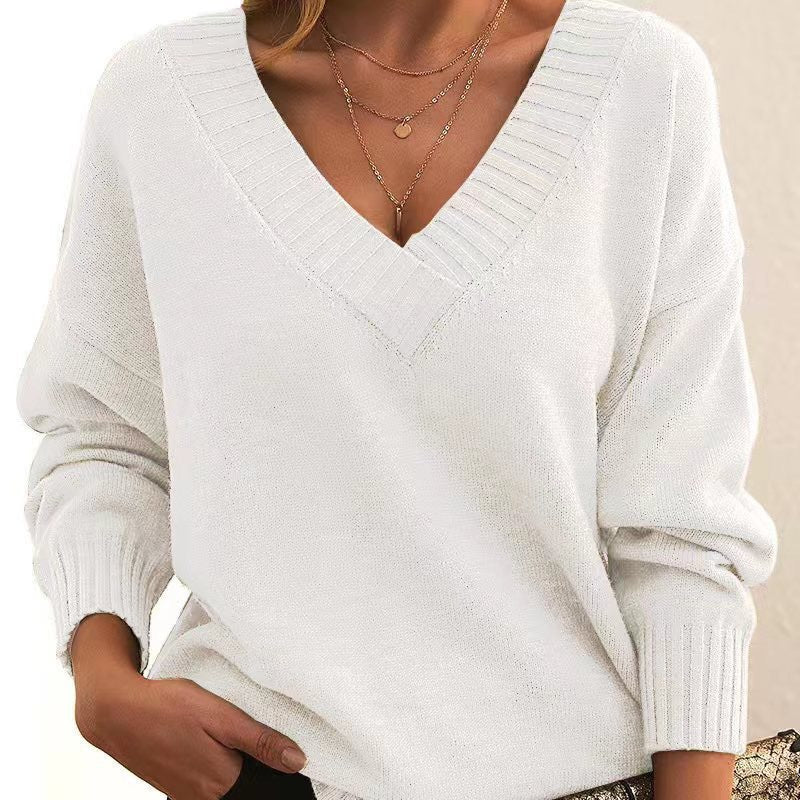 Women's relaxed V-neck knit sweater with ribbed cuffs and neckline for cozy all-day comfort