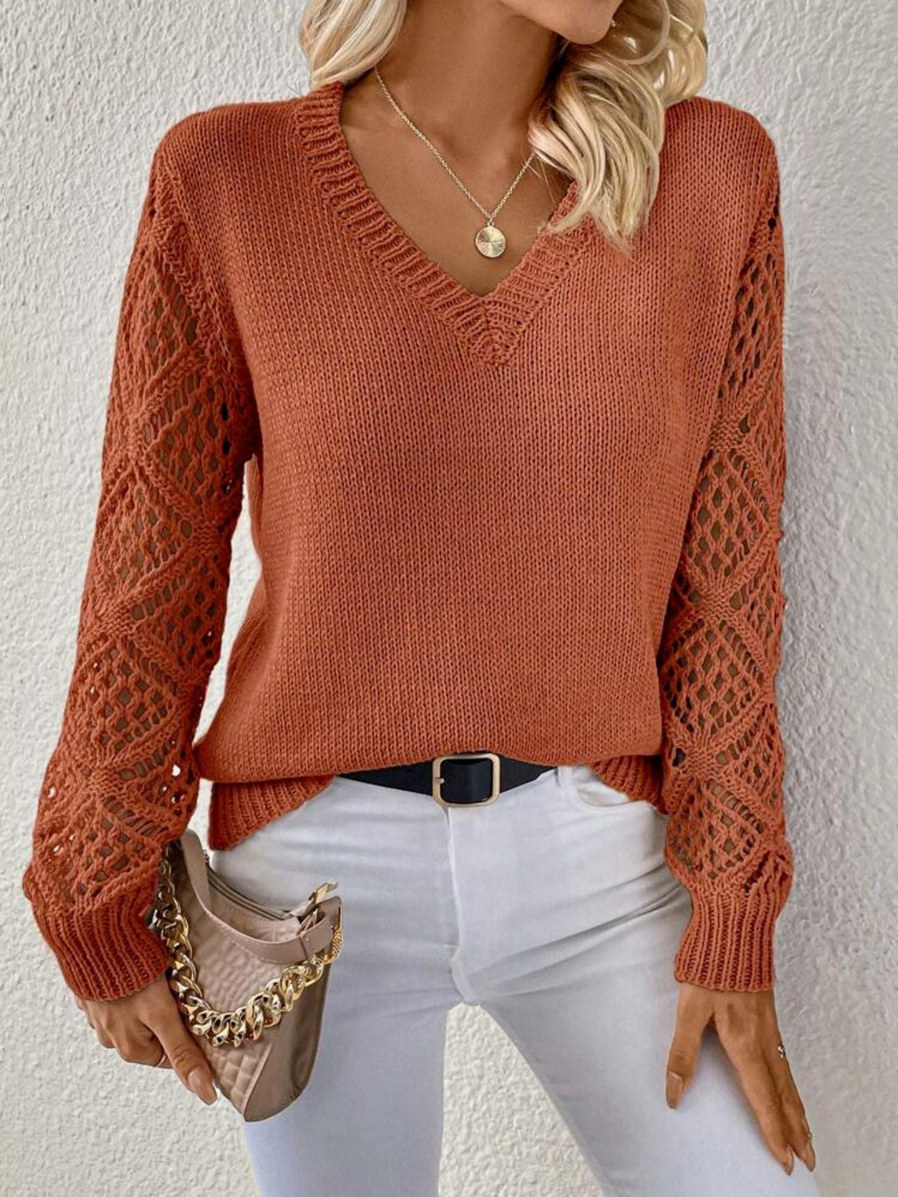 Women's beige V-neck knit sweater with open-work crochet sleeves, relaxed fit for effortless layering