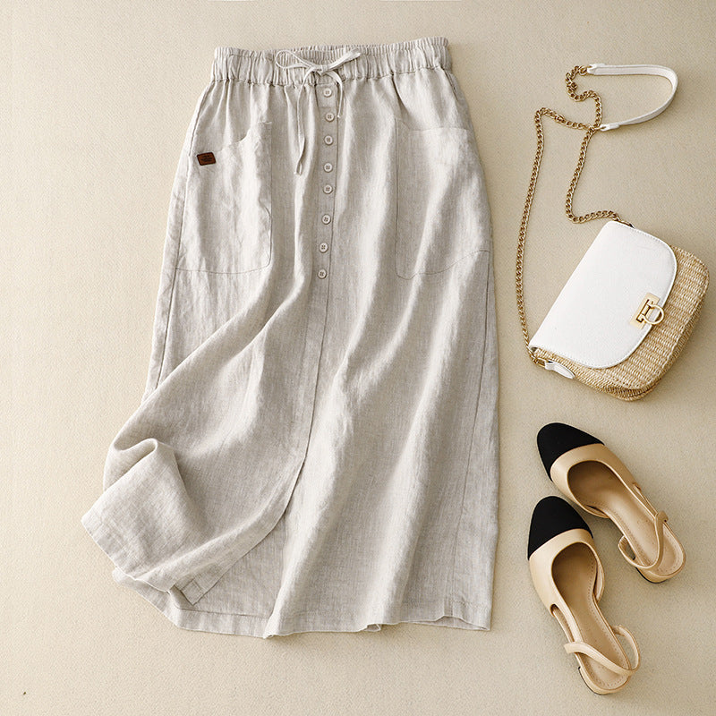 Women's natural fiber A-line midi skirt with drawstring waist and pockets, relaxed everyday fit