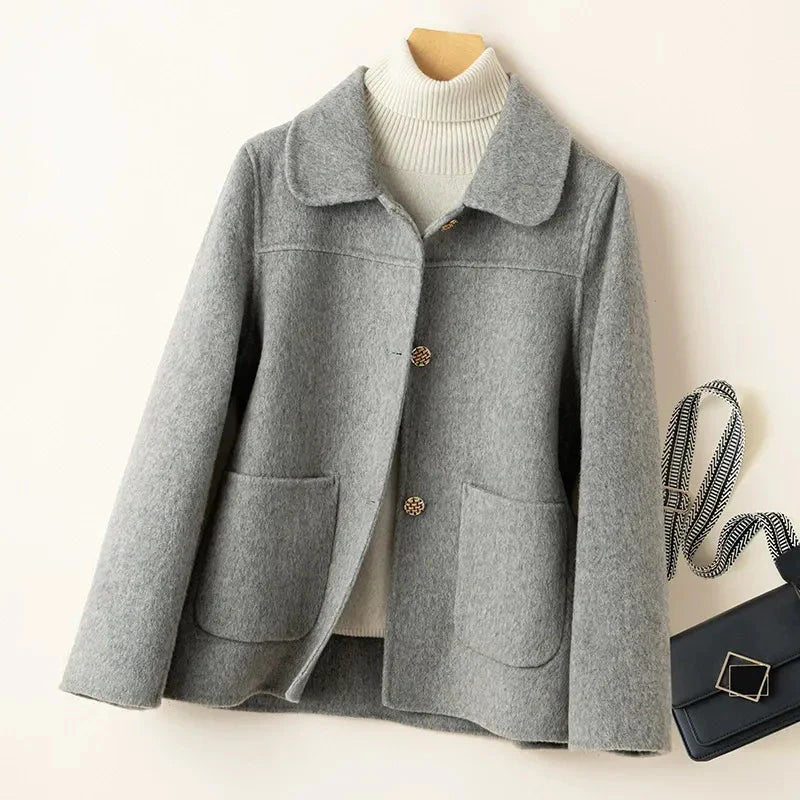 Women's boxy wool jacket with Peter Pan collar in relaxed oversized fit for everyday layered style
